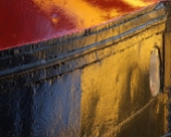 Colors reflected in a boat hull