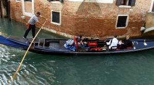 For many tourists, a gondola ride is an essential Venetian activity. Click this image to see a short video of a musical gondola ride I happened upon. (The video will open in a new window, which you can close to return to the blog.)
